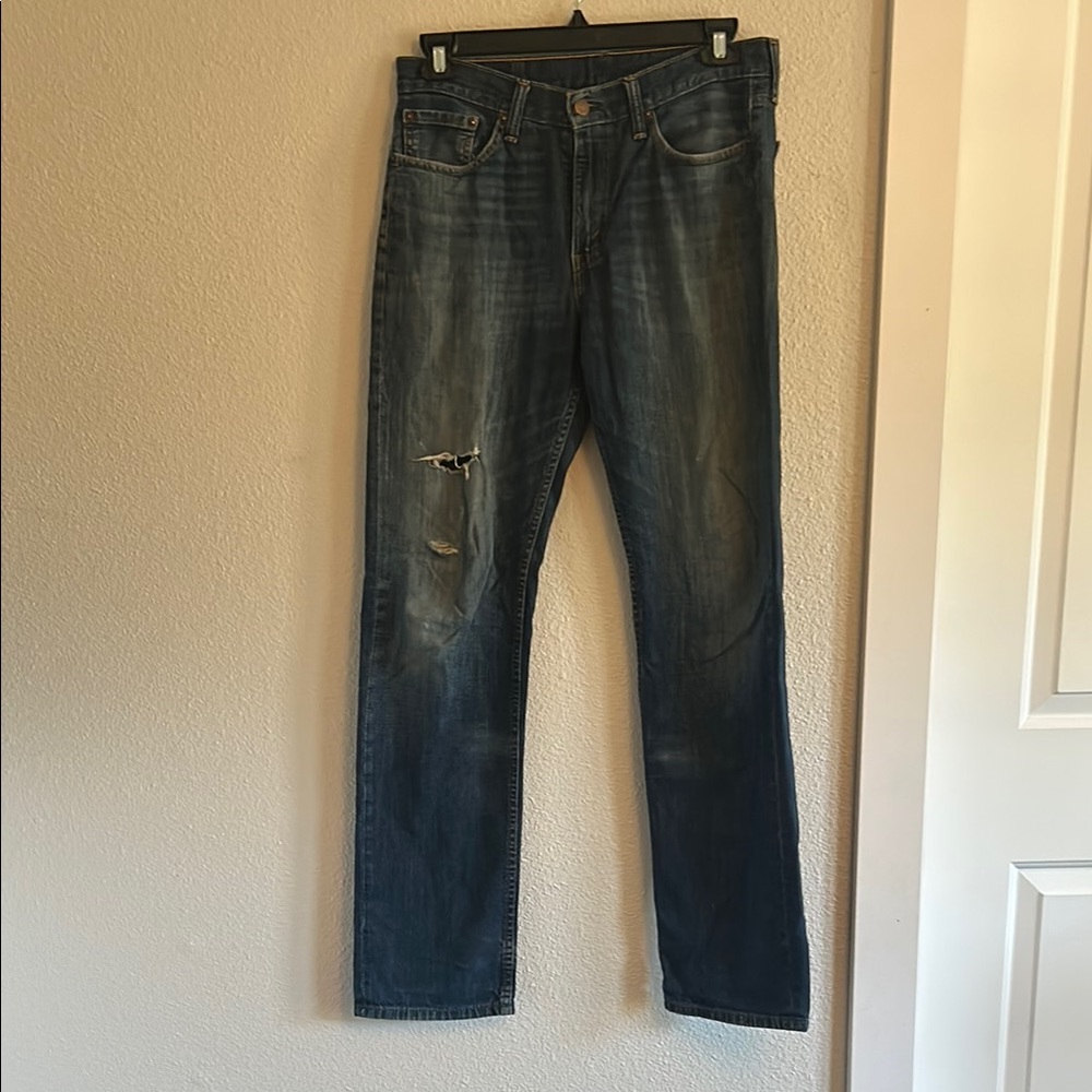 Distressed Blue Denim Jeans